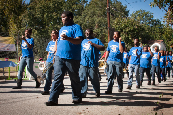 Youth marching during the Festival of Lights parade in Atlanta’s Westside
