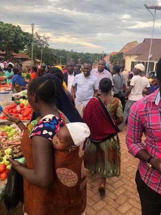 ACT elected officials, local councilors and MP Zitto Kabwe, visiting the solar-powered night market in Kigoma Town.